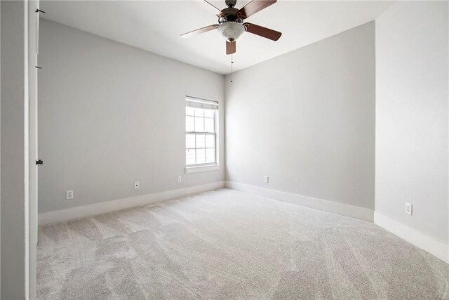 3706 Cherokee Rd, Rogers, AR 72758 - carpeted empty room with ceiling fan and baseboards