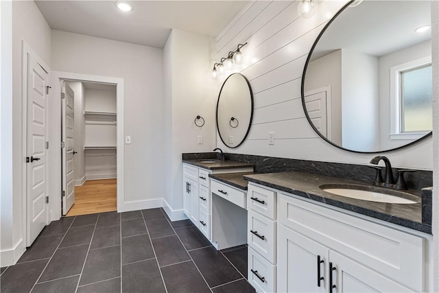 bathroom featuring tile patterned floors and vanity