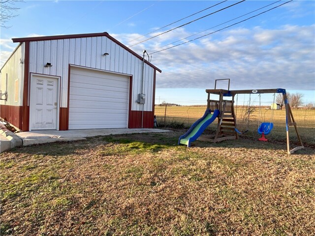 garage with a yard