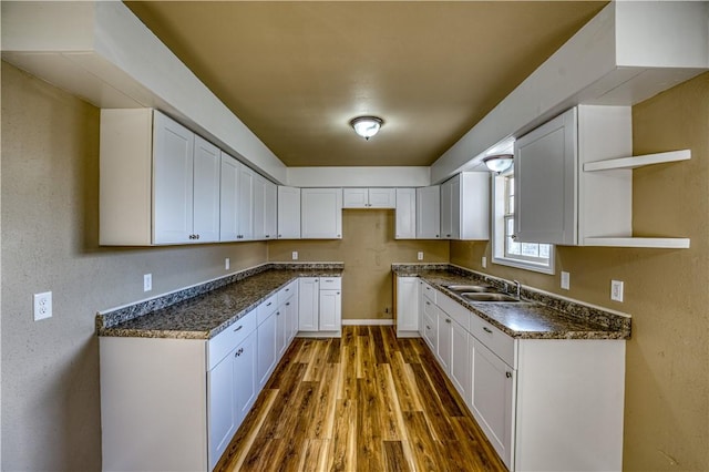 7620 Rally Hill Rd, Harrison, AR 72633 - kitchen featuring open shelves, dark wood-style flooring, and white cabinetry