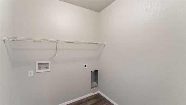 laundry area featuring electric dryer hookup, washer hookup, and hardwood / wood-style flooring