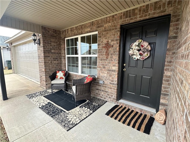 view of exterior entry featuring a porch