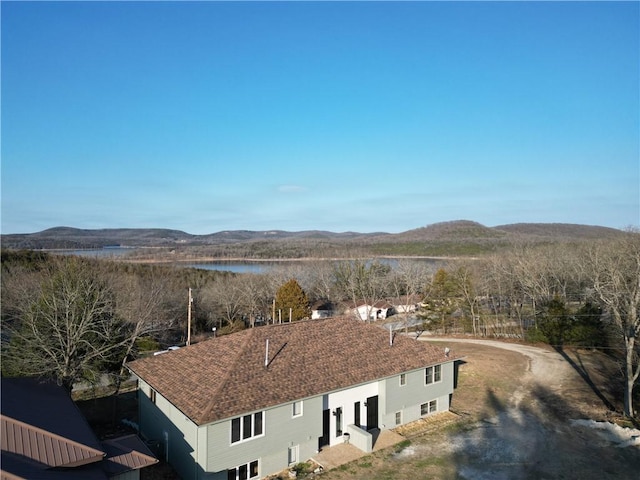 birds eye view of property with a mountain view