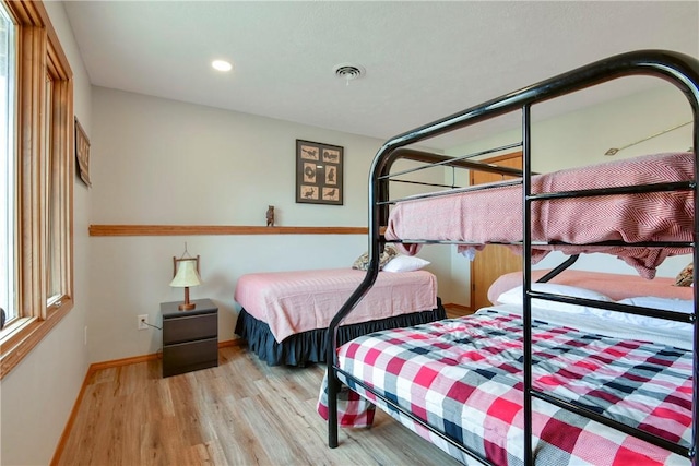 bedroom featuring light wood-type flooring