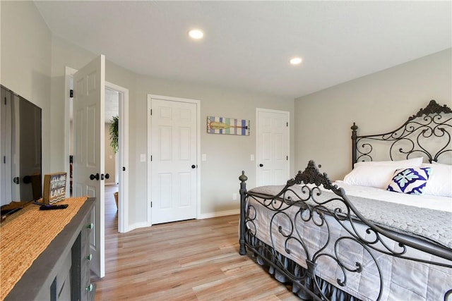 bedroom featuring light hardwood / wood-style flooring