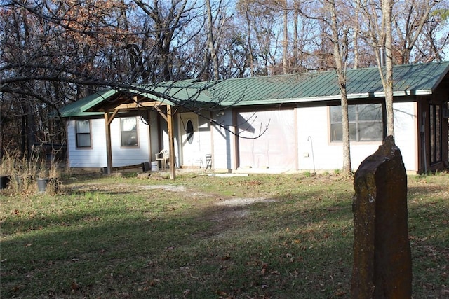 exterior space with a front yard