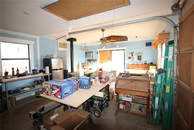 interior space featuring ceiling fan