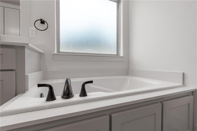 bathroom with a bathing tub