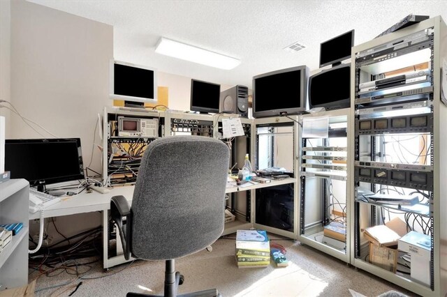 office featuring a textured ceiling