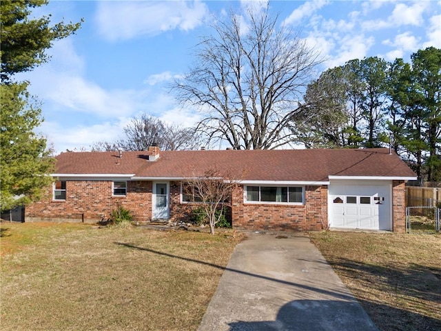 single story home with a front lawn and a garage