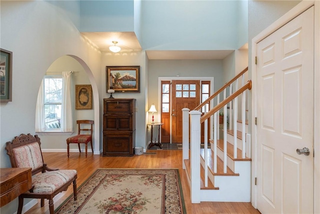 entryway with light hardwood / wood-style floors