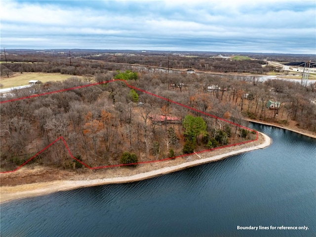 aerial view featuring a rural view and a water view