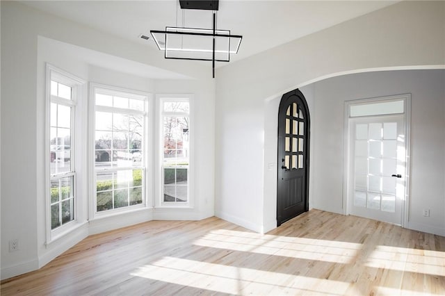 entryway with light hardwood / wood-style floors