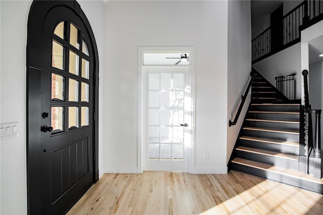 foyer with light hardwood / wood-style floors