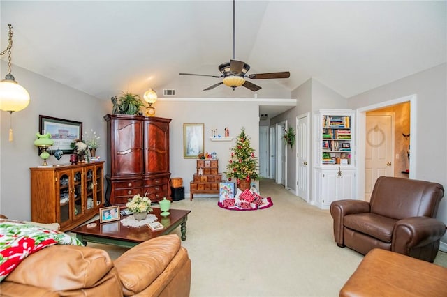 living room featuring carpet floors, ceiling fan, and lofted ceiling