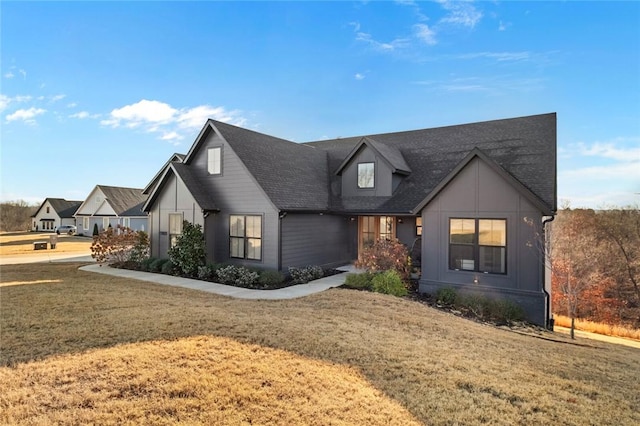 modern farmhouse with a front yard