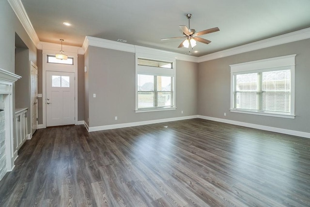 entryway featuring ceiling fan, dark hardwood / wood-style flooring, and ornamental molding