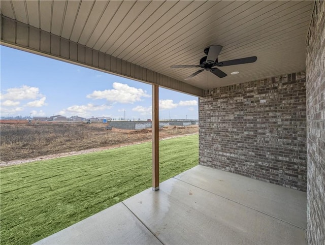 view of patio / terrace featuring ceiling fan