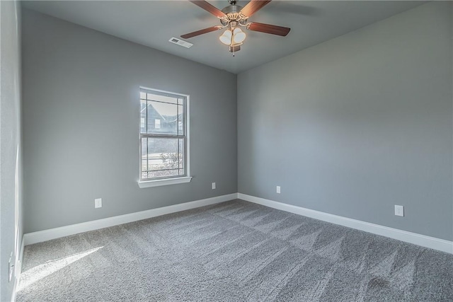 carpeted empty room with ceiling fan