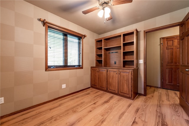 interior space featuring ceiling fan and light hardwood / wood-style flooring