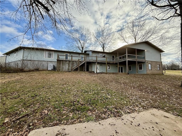 back of property with a deck