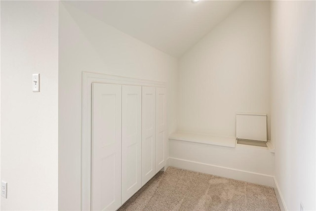 18 Mcdole Ln, Bella Vista, AR 72715 - interior space featuring baseboards, lofted ceiling, and light colored carpet