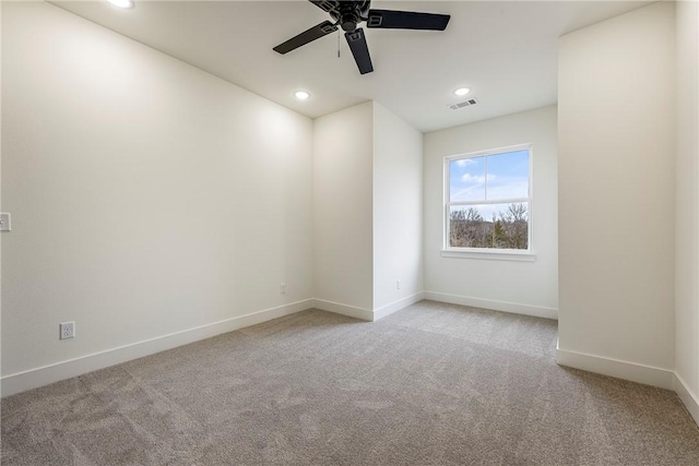 18 Mcdole Ln, Bella Vista, AR 72715 - unfurnished room featuring a ceiling fan, carpet floors, baseboards, and visible vents