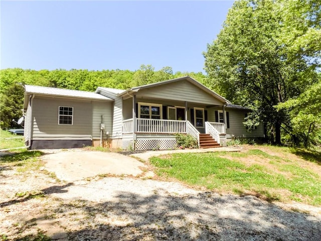 view of front of property featuring covered porch