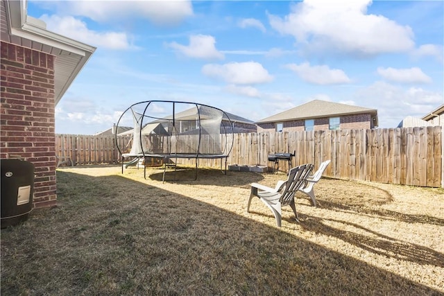 view of yard featuring a trampoline