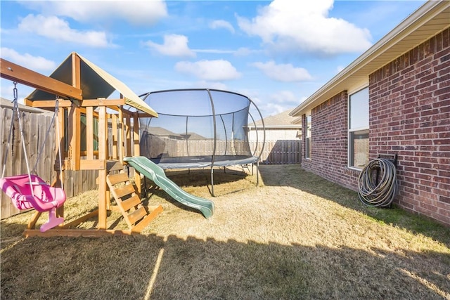 view of play area with a trampoline