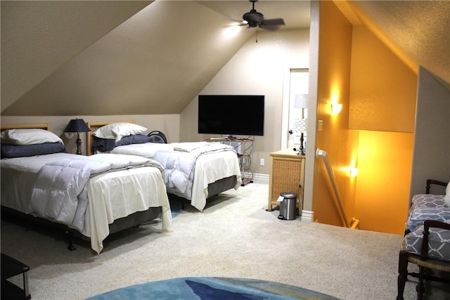 bedroom featuring carpet, ceiling fan, and lofted ceiling