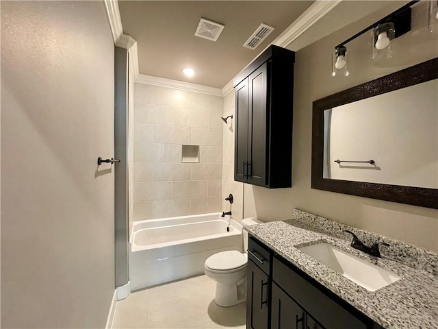 full bathroom with vanity, crown molding, tile patterned flooring, toilet, and tiled shower / bath