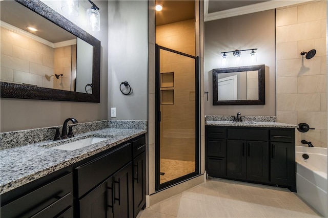 bathroom with tile patterned floors, vanity, separate shower and tub, and ornamental molding