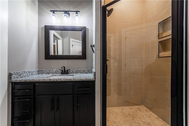 bathroom featuring vanity and walk in shower