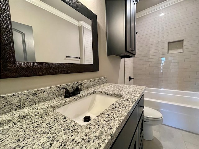 full bathroom with vanity, tile patterned floors, tiled shower / bath, crown molding, and toilet