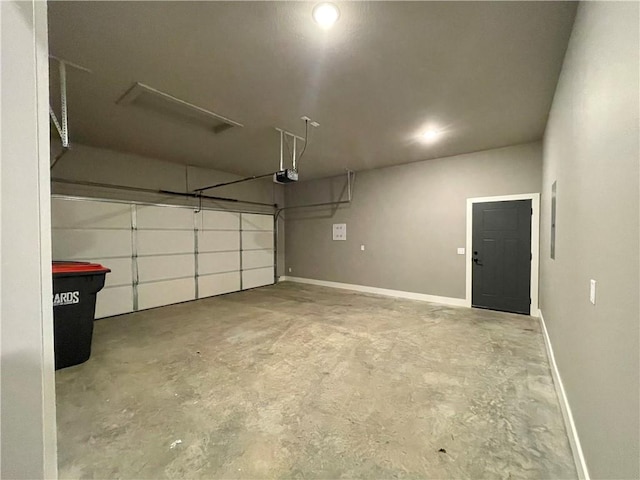 garage featuring a garage door opener