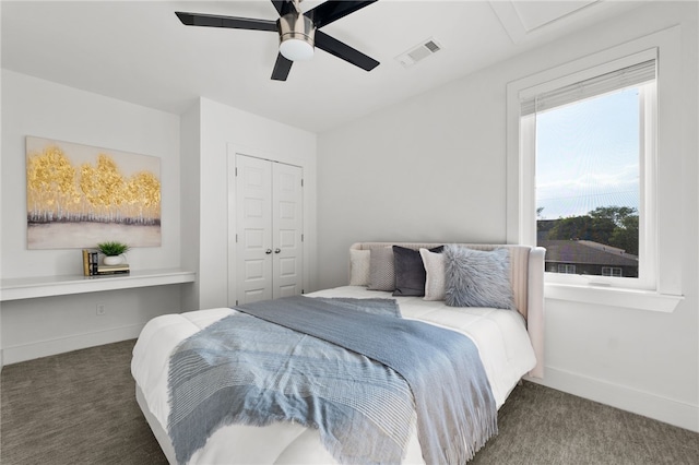 bedroom featuring ceiling fan, carpet floors, and a closet