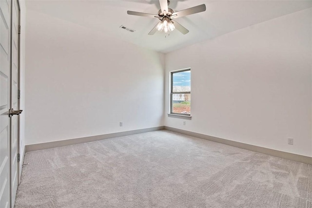 unfurnished room with light carpet and ceiling fan