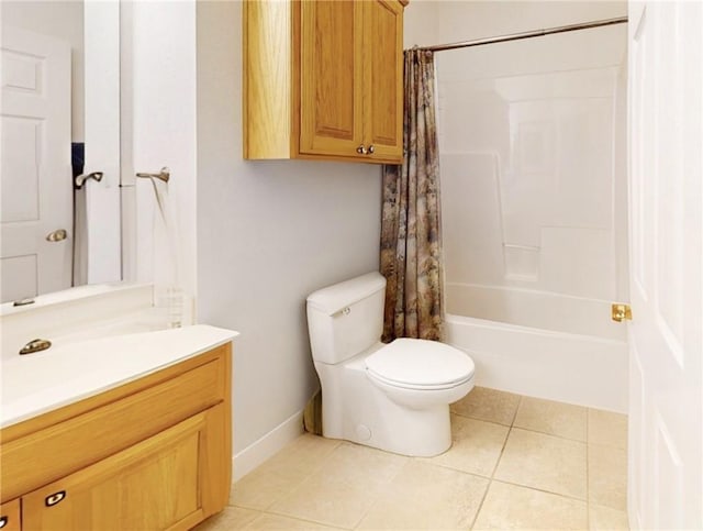 full bathroom featuring tile patterned floors, vanity, toilet, and shower / bath combo with shower curtain