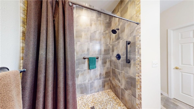 bathroom with curtained shower