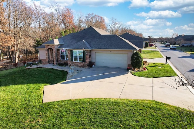 ranch-style house with a front lawn and a garage