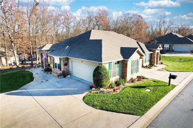 view of home's exterior with a yard and a garage