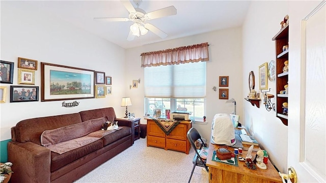 carpeted living room featuring ceiling fan