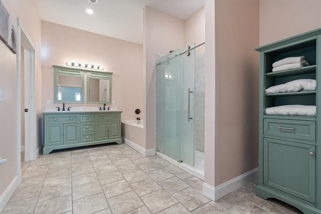 bathroom featuring vanity and plus walk in shower