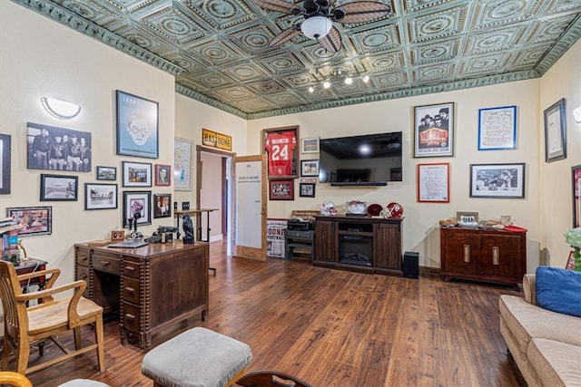 office with dark hardwood / wood-style flooring and ceiling fan