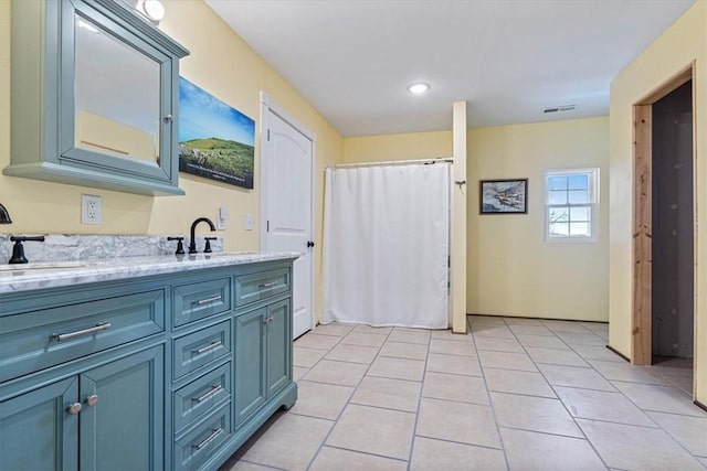 1395 County Road 403, Berryville, AR 72616 - full bathroom featuring double vanity, tile patterned floors, recessed lighting, and a shower with curtain