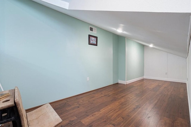 basement with dark wood-type flooring