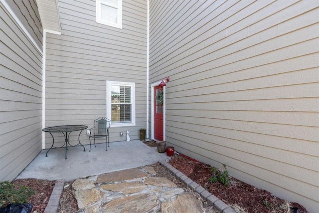 1395 County Road 403, Berryville, AR 72616 - doorway to property with a patio