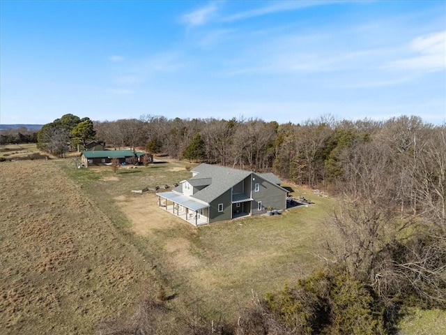 birds eye view of property featuring a rural view