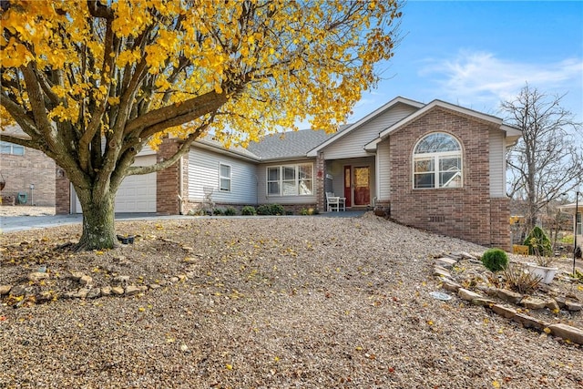 single story home with a garage